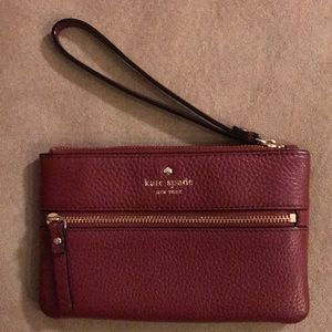 Kate Spade burgundy wristlet